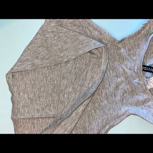 Gray halter neck cropped top.